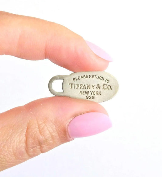 Return to Tiffany & Co New York Oval Tag Pendant 925 Sterling Silver