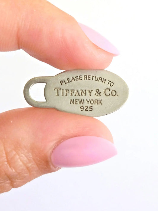 Return to Tiffany & Co New York Oval Tag Pendant 925 Sterling Silver