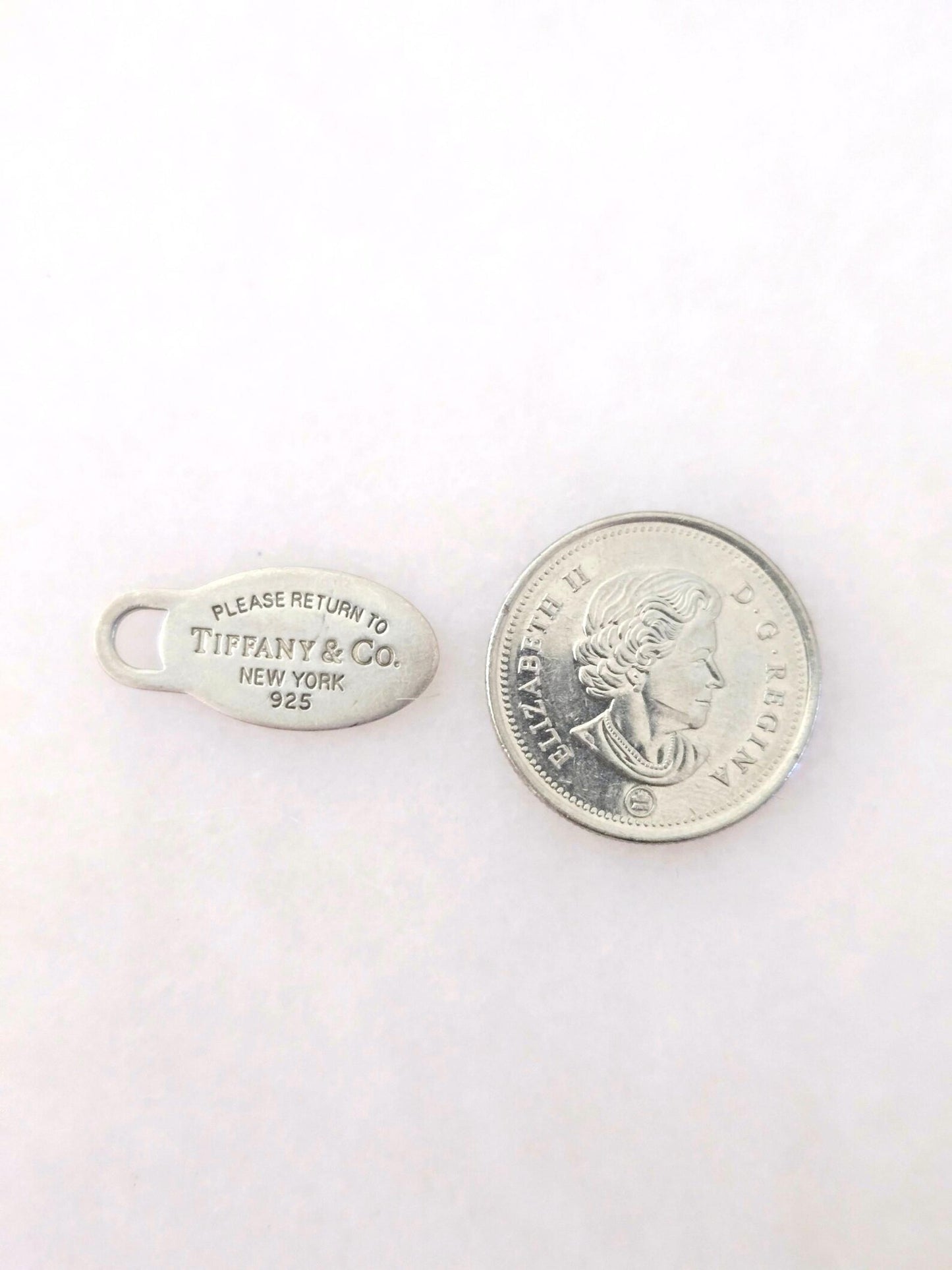 Return to Tiffany & Co New York Oval Tag Pendant 925 Sterling Silver