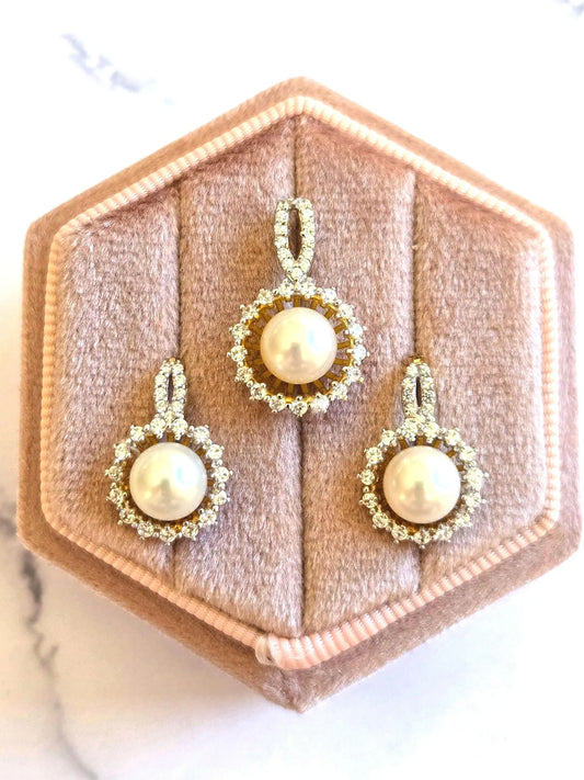 18k gold pearl pendant and matching earrings with cubic zirconia accents, 750 stamped.